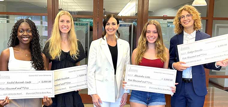 Essay winners with $5,000 checks