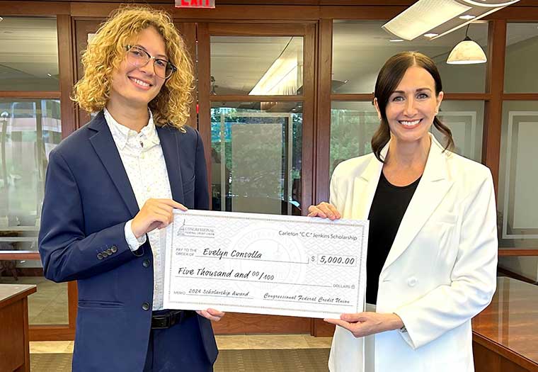 Evelyn Consolla with $5,000 check